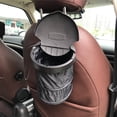 thumbnail image 1 of Cubo de basura plegable para coche con tapa | Organizador trasero de tela Oxford | Bolsa de basura de gran capacidad | Fácil instalación y limpieza | Universal para SUV, camión, furgoneta | 20.5x16, 1 of 9