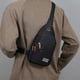 thumbnail image 1 of Bolso bandolera para hombre | Riñonera multicapa para viajes y desplazamientos | Bolso de hombro de nailon con puerto para auriculares | Organizador de objetos pequeños para uso diario masculino, 1 of 7