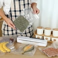 thumbnail image 1 of Machine de Mise sous Vide pour Sacs, Scelleuse Alimentaire, Scelleuse sous Vide, Protection Sécuritaire, Machine Automatique de Mise sous Vide pour Aliments, Compacte, Portable, Puissante Aspiration, Système de Mise sous Vide à Air, 1 of 7