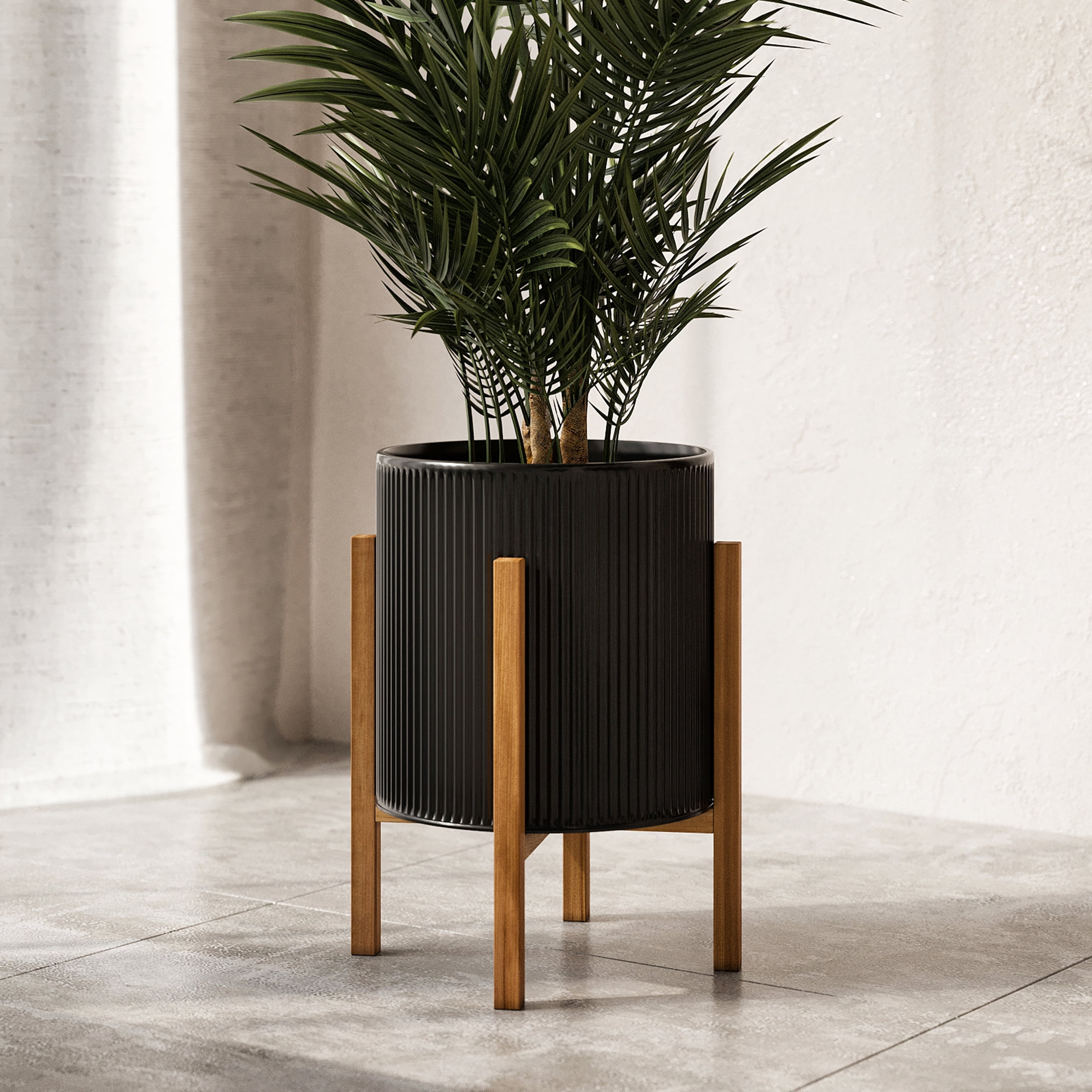 Aspire Home Accents 18.25” x 14” Black Mid-Century Modern Metal Planter with 4-Leg Wood Base