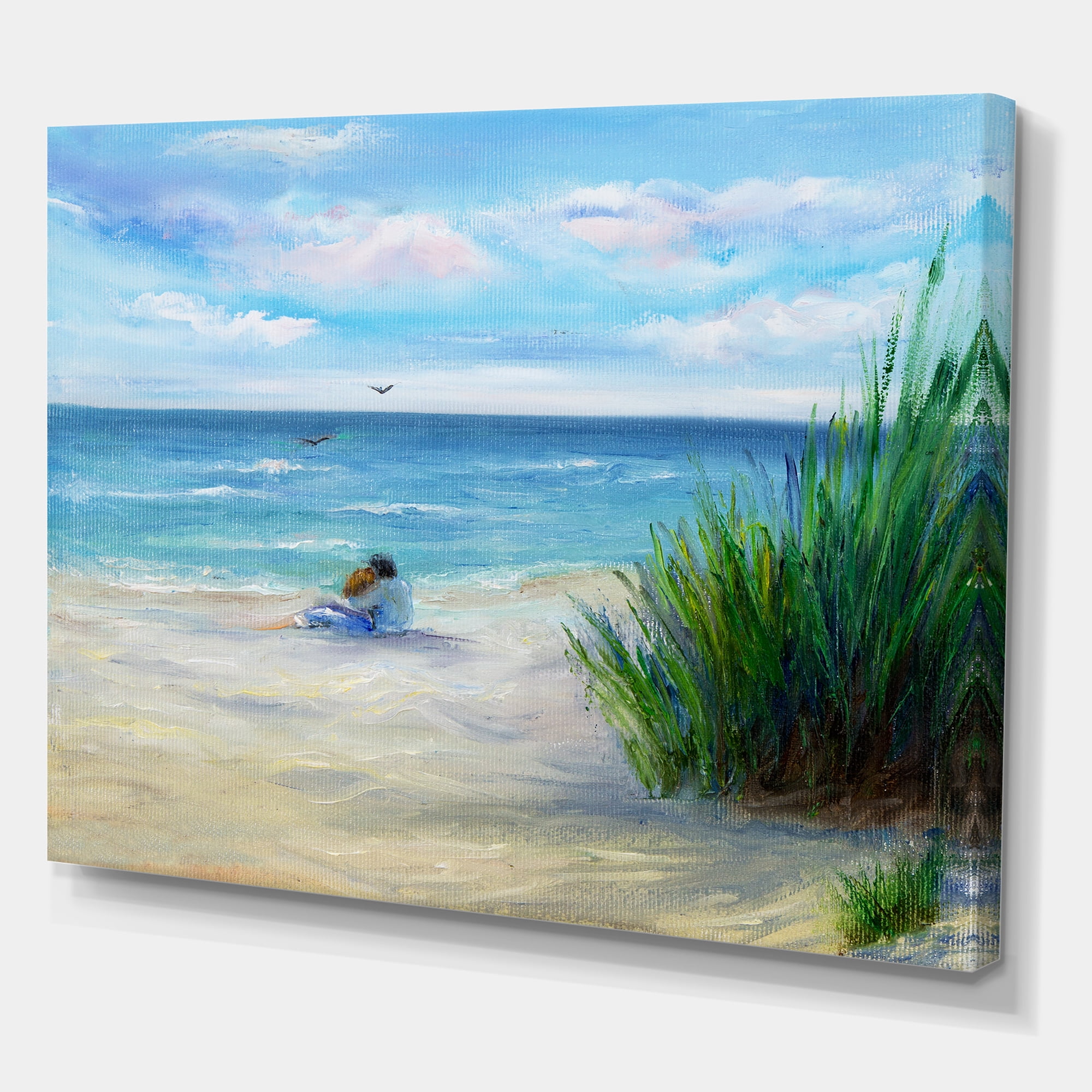 Designart ' Couple Sitting In Love By The Beach ' Nautical & Coastal Canvas Wall Art Print