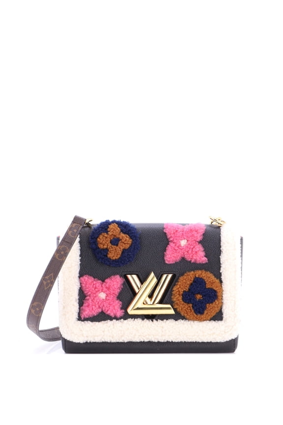 Pre-Owned Twist Handbag Leather and Monogram Teddy Shearling MM By Rebag