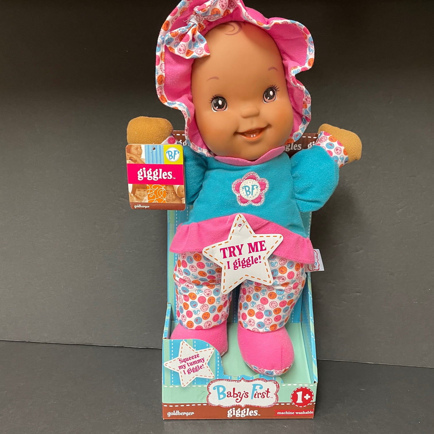 BABY'S FIRST GIGGLES SQUEEZE ME & I GIGGLE SOFT BODY PLUSH DOLL. 