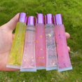 thumbnail image 3 of Brillo de labios Squeeze Tubes AJLTPA, 15 ml (50 unidades), rosa y morado, 3 of 4