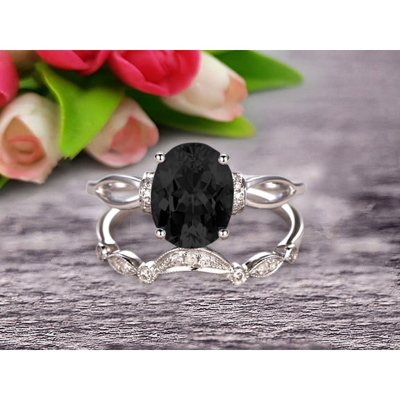 2.25 Carat Oval Cut Black Diamond Moissanite Bridal Ring Set With Curved Loop Stacking Matching Wedding Band On 10k White Gold