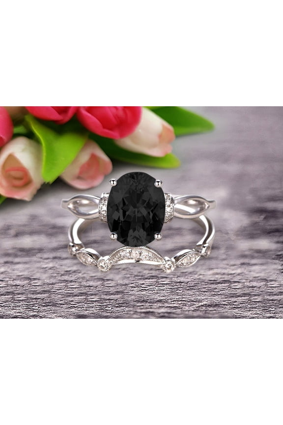 2.25 Carat Oval Cut Black Diamond Moissanite Bridal Ring Set With Curved Loop Stacking Matching Wedding Band On 10k White Gold