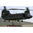 thumbnail image 2 of Personnel attach a storage container to a CH-47 Chinook helicopter Poster Print, 2 of 2