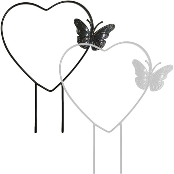 2 enrejados para plantas trepadoras en maceta de metal con forma de corazón.