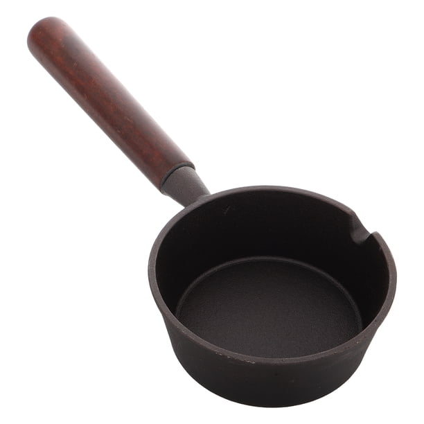 Mini sartén de hierro fundido redonda antiadherente para un solo huevo con mango de madera resistente al calor para cocinar y hornear en la cocina.