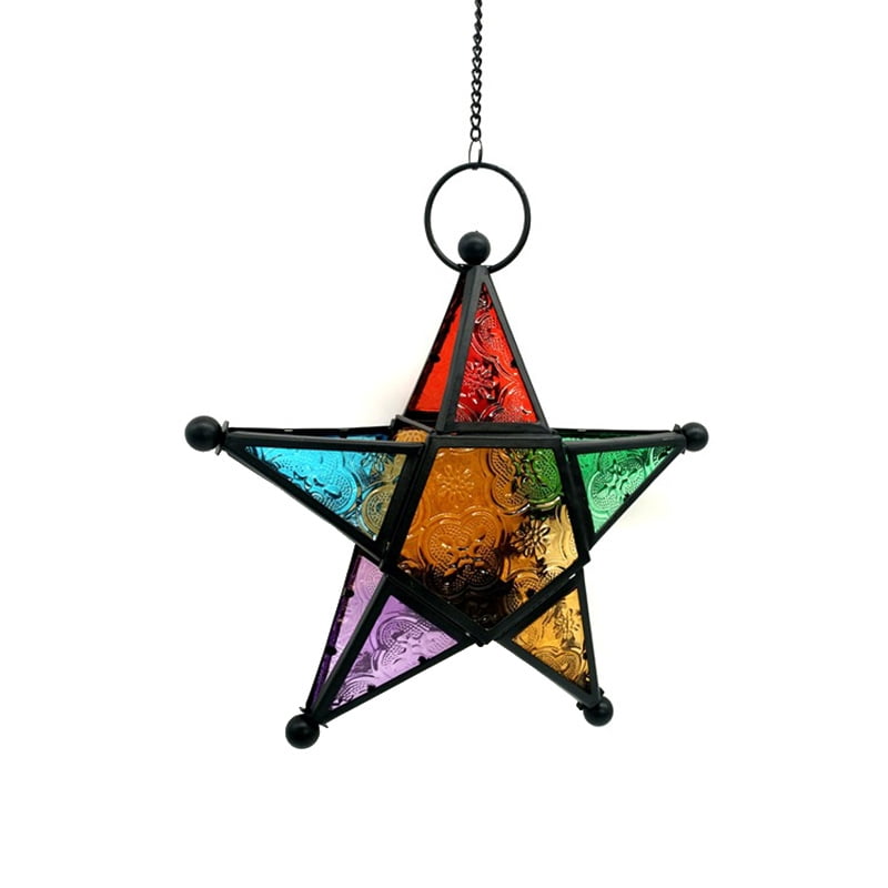 Beautiful wrought iron candle holder with stained glass. Beautiful wrought iron candle holder with stained glass.