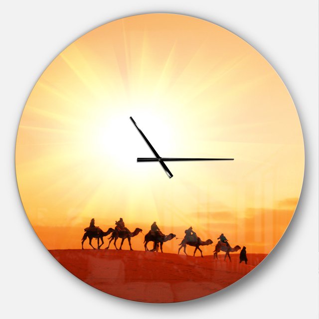 Designart 'Caravan in Sahara Dessert ' Modern wall clock