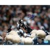 Lou Holtz Autographed Notre Dame Players Pointing in Air 8" x 10" Photograph