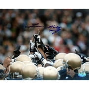 Lou Holtz Autographed Notre Dame Players Pointing in Air 8" x 10" Photograph