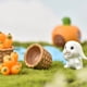 thumbnail image 4 of Xihbxyly Jardín de Hadas En Miniatura, Figuras de Plástico de Colores, 4 Mini Conejos y Cesta de Zanahorias, Bonitas Decoraciones de Mesa, Perfecto para Manualidades, Regalos de Pascua y Cumpleaños,, 4 of 7