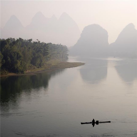 Posterazzi DPI1846515LARGE Li River Yangshuo County Guilin Guangxi Province China - Lone Boater Poster Print, Large - 24 x 24
