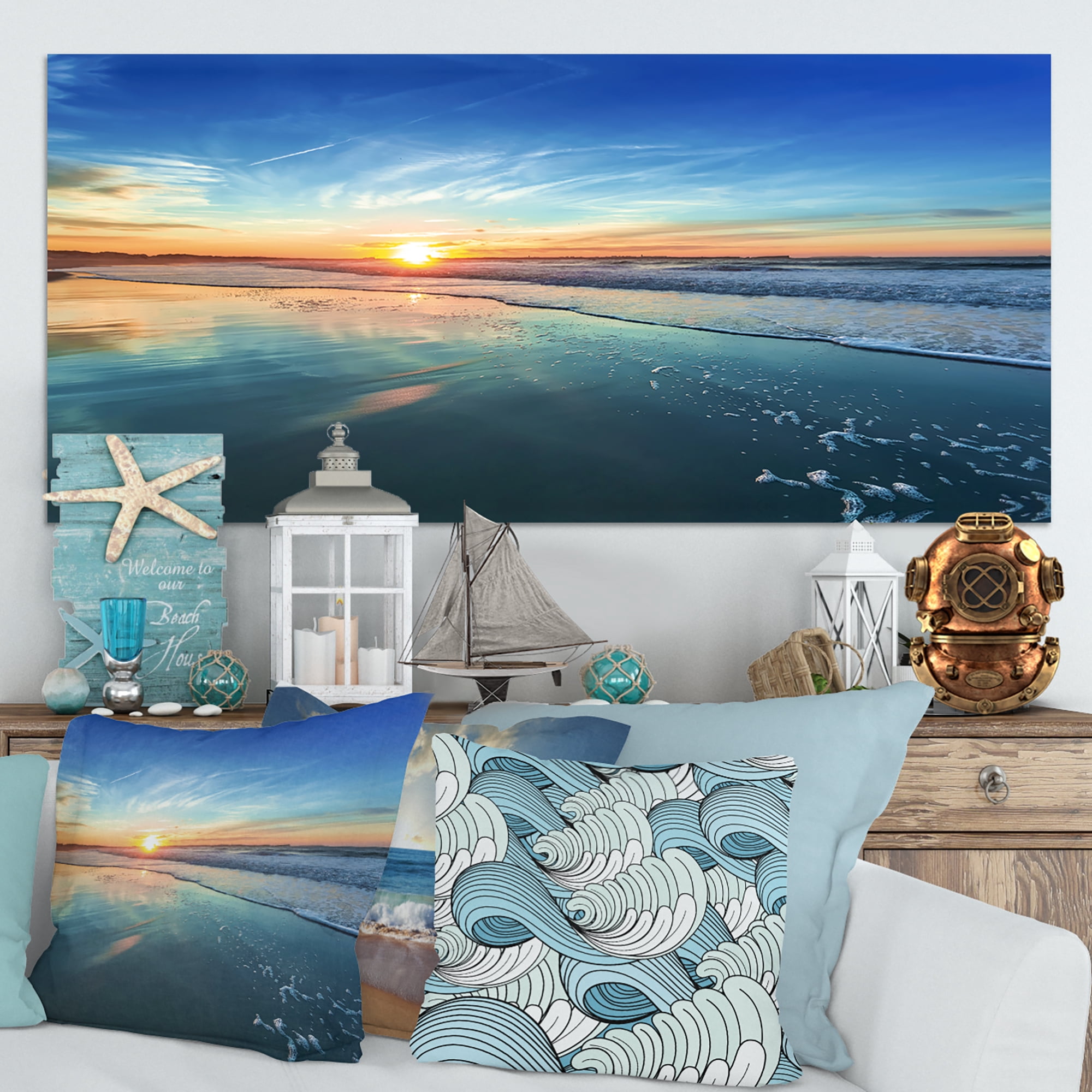 Designart 'Blue Seashore with Distant Sunset ' Seascape Canvas Art Print