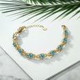 thumbnail image 5 of Gem Stone King 18K Yellow Gold Plated Silver Swiss Blue Topaz Tennis Bracelet for Women (9.65 Cttw, Gemstone Birthstone, Oval 6X4MM, 7 inch With 1 inch Extender), 5 of 5