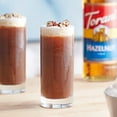 thumbnail image 2 of Torani Classic Hazelnut Flavoring Syrup Plastic 750 mL Bonus Squeeze Pump – Premium Toasted Nutty Barista Café Syrup, Pure Cane Sugar Formula, Shatterproof PET Bottle, 2 of 3