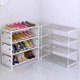 thumbnail image 5 of Estante de zapatos de tela anti-polvo, 4 niveles, diseño de oso, fácil de armar, colores variados, material duradero, tamaño compacto, ideal para organización., 5 of 5