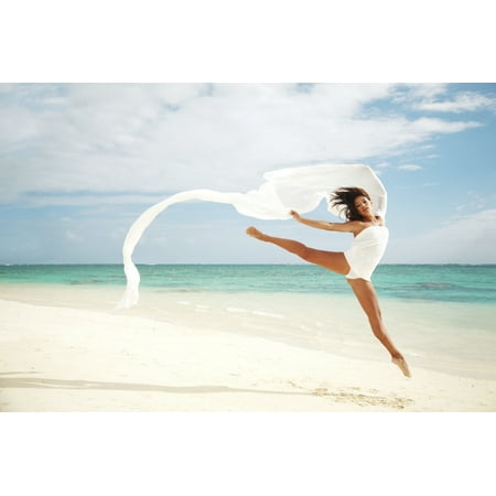 Hawaii Oahu Lanikai Beach Beautiful Female Ballet Dancer Leaping Into Air On Beach With White Flowing Fabric