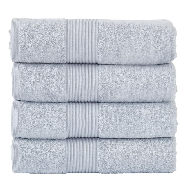 Fabstyles Super Soft and Absorbent Bath Towel set of 4 in light grey, stacked to show plush 100% cotton terry loop weave with ribbed band, sized 27 by 54 inches, quick drying and hotel-quality towels ideal for spa, home, and hotel use.