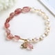 thumbnail image 2 of Pulsera de miel de tocador de perlas de agua dulce natural pulsera de cristal ins nicho diseño estilo coreano hermana neta pulsera roja cristal de fresa, 2 of 2