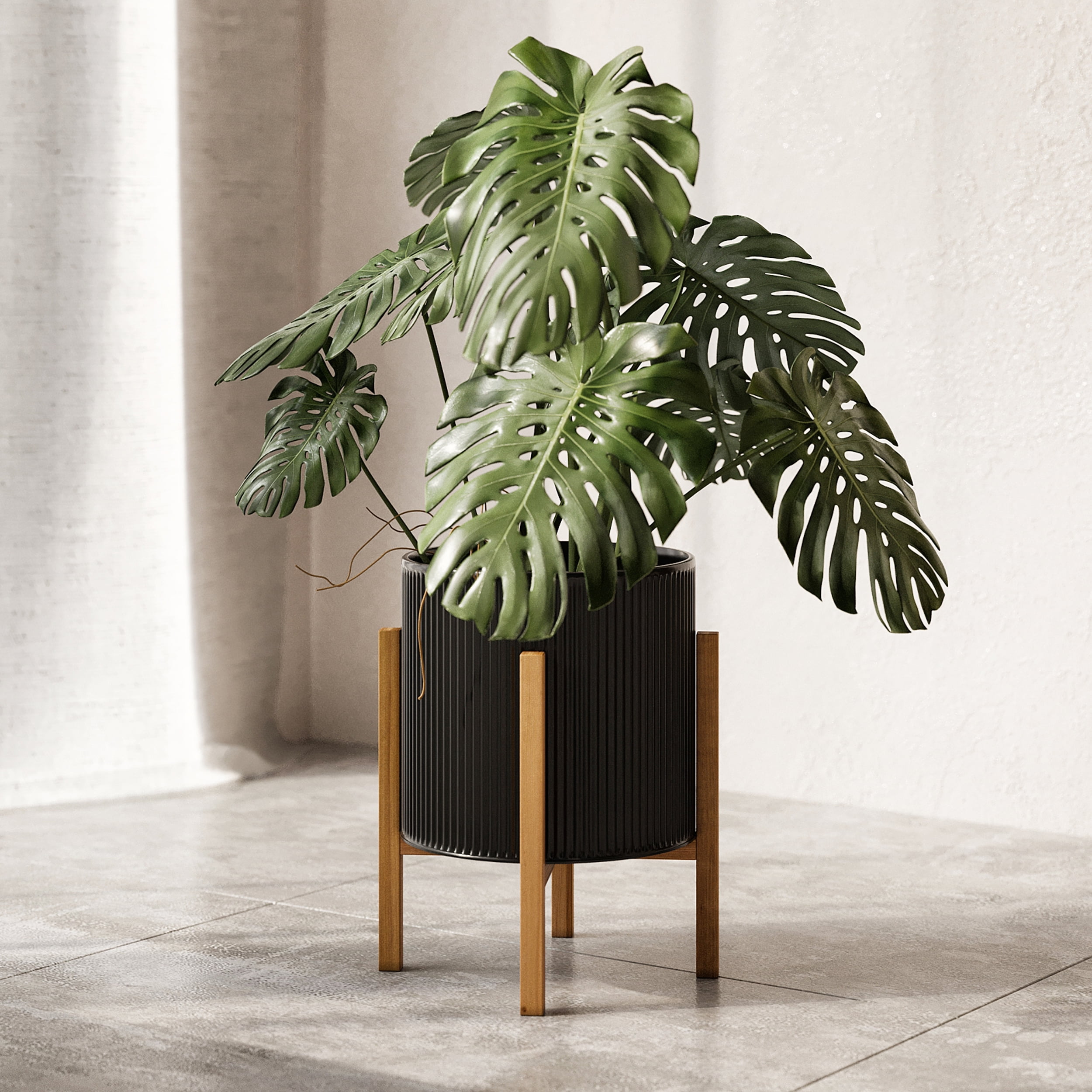 Aspire Home Accents 14.75” x 12” Black Mid-Century Modern Metal Planter with 4-Leg Wood Base