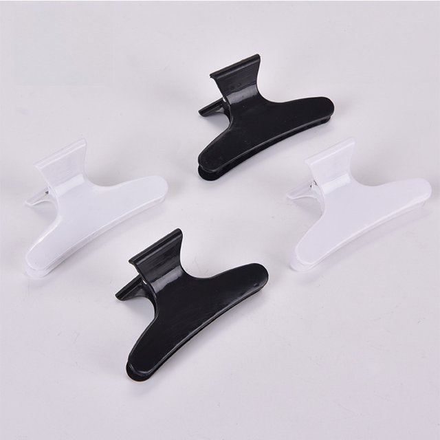 Pinza de peluquería pequeña pinza de mariposa plato de peluquería blanco y negro horquilla de posicionamiento del cabello horquilla de plástico