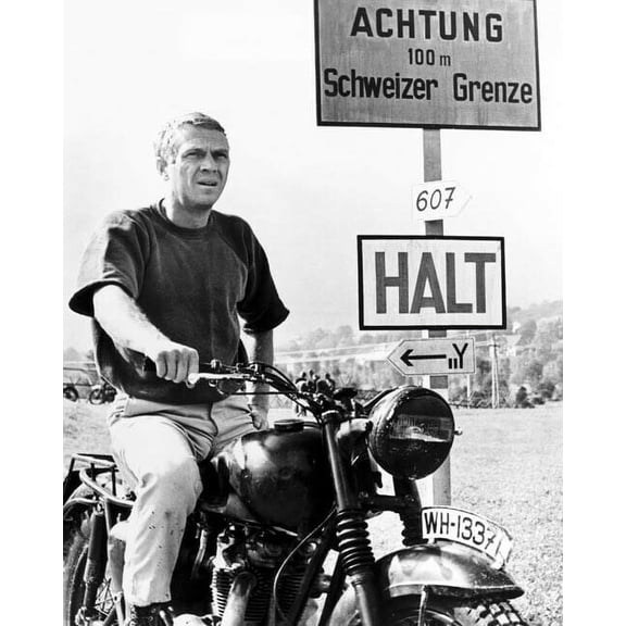 Steve McQueen sits astride Triumph bike by Swiss border Great Escape Poster