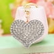 thumbnail image 4 of Llavero de Corazón y Melocotón para San Valentín | Llavero de Aleación con Forma de Corazón para Mochila, Bolso y Móvil | Regalo Romántico para Parejas | 9,5 X 4 Cm | Rosa, Rojo, Blanco, Dorado, 4 of 6