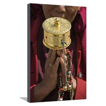 Heys 4 Wheel Bhutan, Thimphu. Woman Holding a Prayer Wheel and Prayer Beads as She Performs Her Circumambulation Stretched Canvas Print Wall Art By Brenda Tharp ()