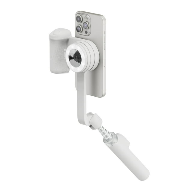 ShiftCam SnapTravel Kit Essential Stone mounted on a silver smartphone, featuring a magnetic camera grip with a textured ergonomic handle, integrated circular LED light, and an extendable white selfie stick arm for hands-free, stabilized mobile content creation and vlogging.