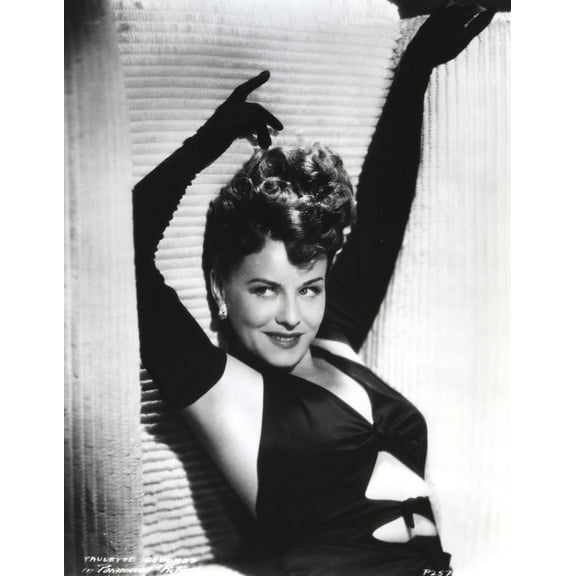 Paulette Goddard Posed with Hands Upwards wearing Sexy Black Outfit with Gloves Photo Print (8 x 10)