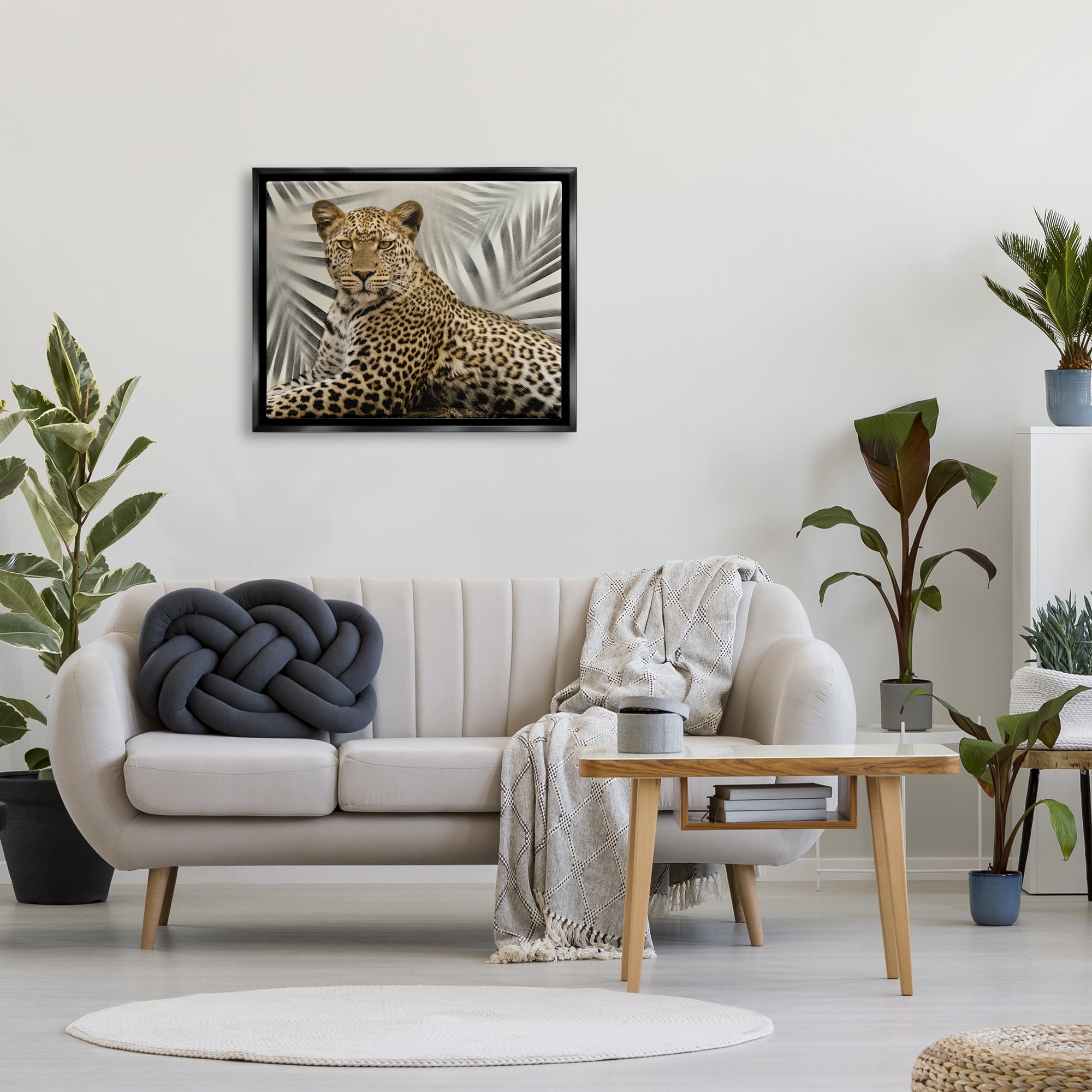 Stupell Industries Leopard with Palm Fronds Animals & Insects Painting Black Floater Framed Canvas Art Print Wall Art, 31 x 25