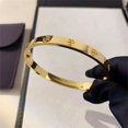thumbnail image 1 of Pulsera de circón y tuerca cruzada para mujer, brazalete de acero inoxidable, joyería de marca, nuevo diseño, 2023, 1 of 4