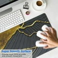 thumbnail image 4 of "Upgrade Your Desk Experience: Large, Non-Slip Rubber Base Desk Mat - Waterproof, Durable Seamed Edges. Perfect for Keyboards, Big XL Black Mousepad - 31.5x11.8 inch.", 4 of 7