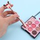 thumbnail image 4 of Juego de brochas de maquillaje navideño con estuche, incluye 6 pinceles para rubor, base, cejas, sombras y labios, ideal como regalo de Navidad., 4 of 6