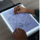 thumbnail image 4 of Mesa de copia LED, tablero de dibujo para niños, mesa de copia transparente, luz nocturna de brillo ajustable, cuaderno, 4 of 5