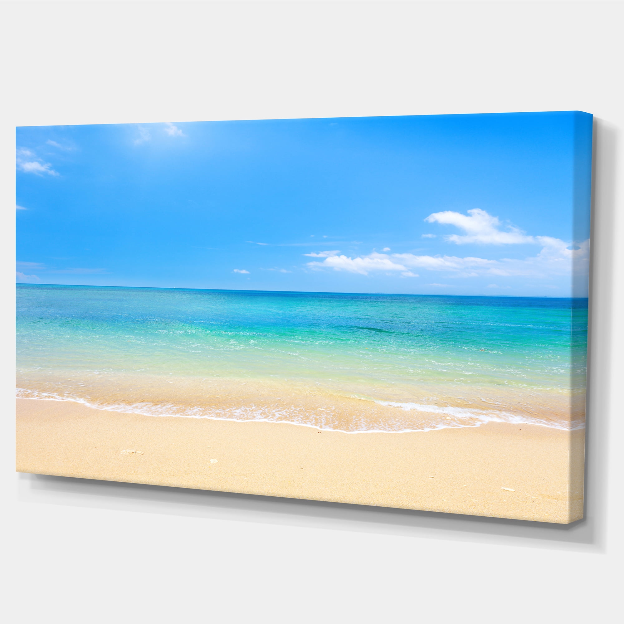 Designart 'Blue Waters Below Blue Sky ' Seashore Photo Canvas Print