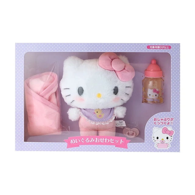traje de bebé kawaii cinnamoroll my melody hellokitty, chupete de bebé sanrios, biberón, conjunto de muñeca de felpa, regalos de cumpleaños — Caja con muñeca de felpa HelloKitty blanca con lazo rosa; incluye babero lila con detalle de pato, biberón plástico rosa decorado, manta rosa doblada y chupón rosa; vista frontal en empaque ventana, caja 32.5 x 9.5 x 22.5 cm, materiales: felpa, poliéster y PP. Adecuado como juguete coleccionable o como adorno para cuarto infantil.
