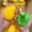 A, variant on NWOKYZGH 1Pc Squishy Gold Mango Colossal Slow Fruit Squishies Toys