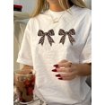 thumbnail image 1 of Camiseta vintage para mujer, con estampado geométrico de leopardo y lazo, de algodón, cuello redondo y manga corta, informal, de verano, para el tiempo libre., 1 of 6