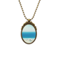 thumbnail image 1 of Playa de arena del mar ciencia naturaleza foto Collar Colgante Vintage de bronce antiguo de joyeria de lujo de regalo Unbranded  M, 1 of 3