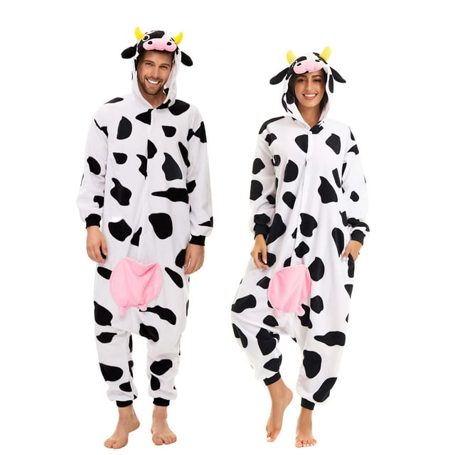 pijama CANASOUR de vaca unisex para Navidad y Halloween pijama enterizo blanco con manchas negras, capucha con orejas y cuernos amarillos, bolsillo delantero rosa en forma de ubres y cierre de botones; felpa ultrasuave y ajuste holgado hasta los tobillos, mostrado en vista frontal y 3/4, también adecuado como disfraz cómodo para fiestas o pijamadas.