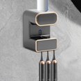 thumbnail image 1 of Dispensador eléctrico de pasta de dientes Macarena montado en la pared Negro, 1 of 8