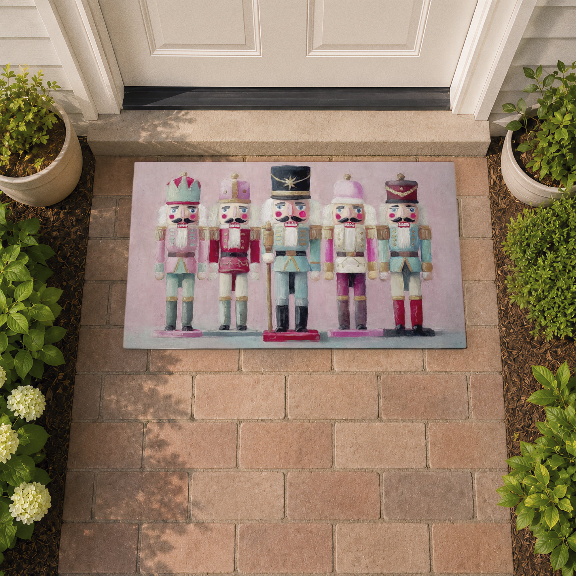 Stupell Industries Classic Nutcrackers on Pink Printed Outdoor Door Floor Mat, design by Nina Blue
