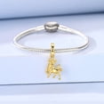 thumbnail image 4 of Dije Universal de Tauro Dorado Bañado en Plata, 4 of 7