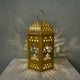 thumbnail image 1 of Mini farol de hierro dorado con luces LED - Ramadán y decoración navideña - Centro de mesa colgante - 9,5x9,5x15cm, 1 of 6