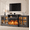 Dark gray, variant on Easoger 97" Fireplace TV Stand with 36'' Fireplace, Entertainment Center TV Console Table for over 100" TVs, Large Storage with Glass Doors & Shelves, LED Backlight, White + Light Walnut