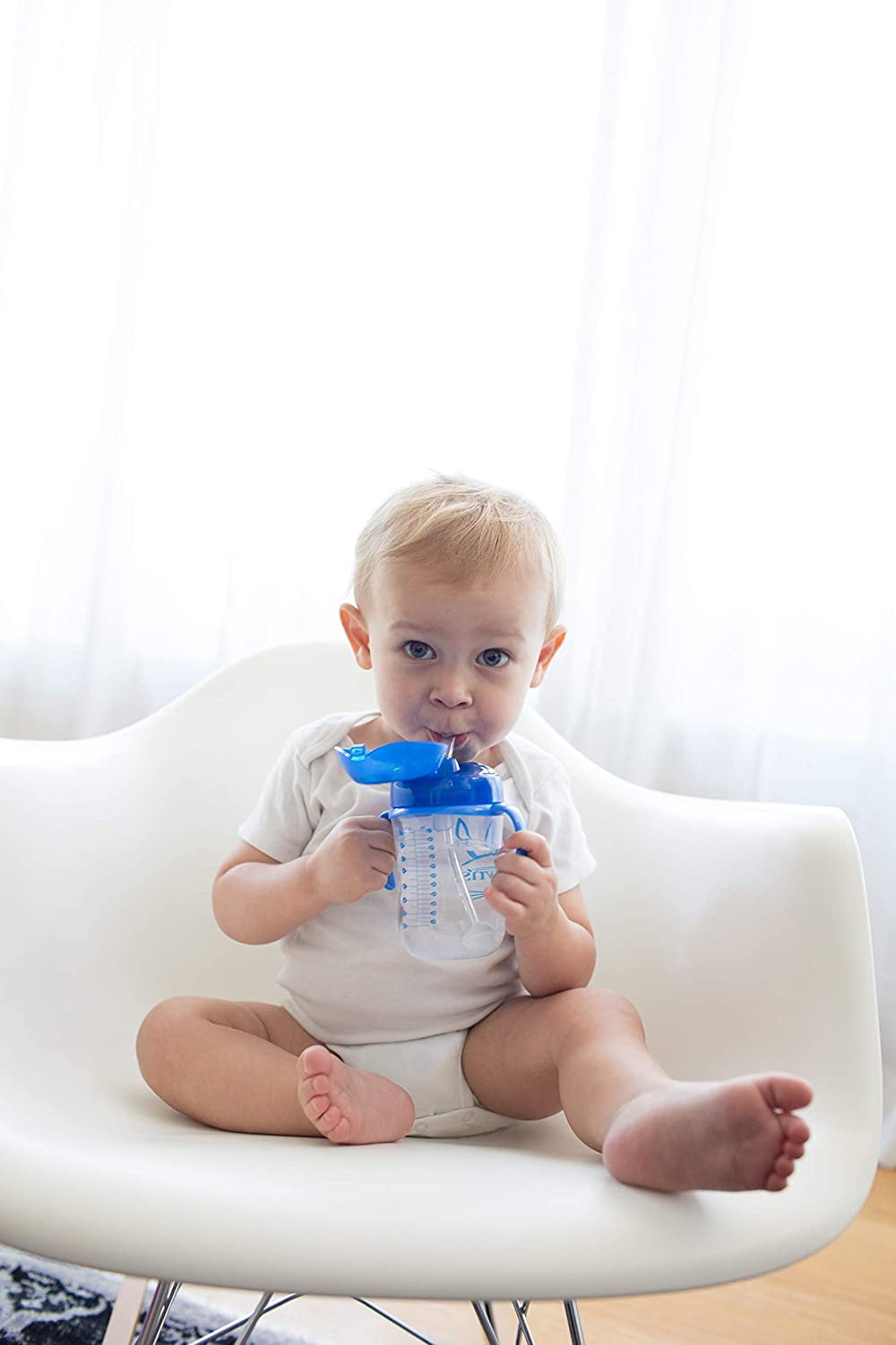 Dr.Brown's® Baby's First Straw Cup is a spill-proof straw cup that